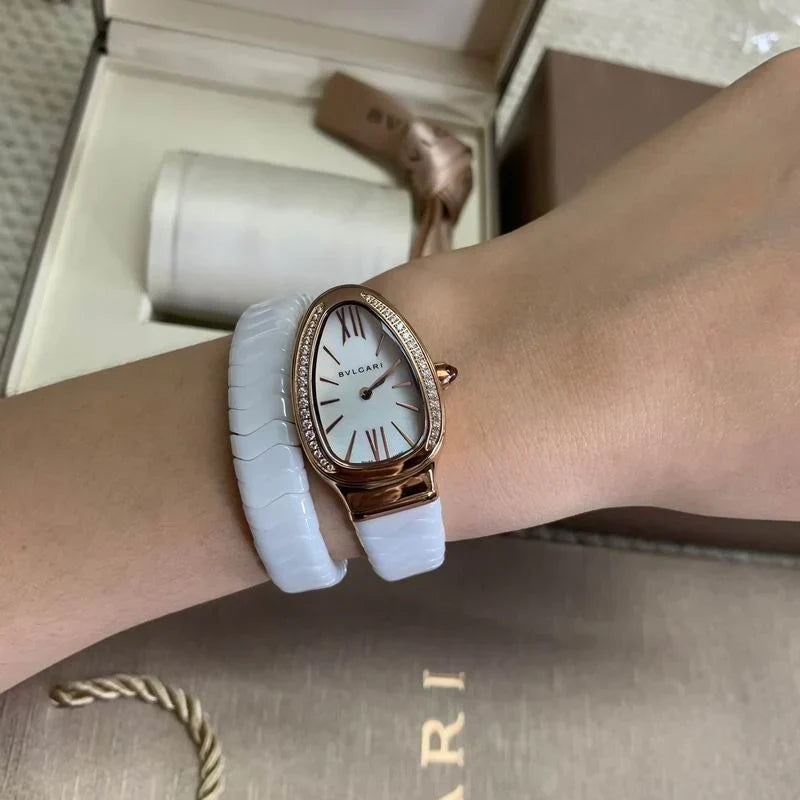 SCULPTURAL SERPENTINE-INSPIRED 35MM TIMEPIECE WITH FLEXIBLE WRAP-AROUND BRACELET