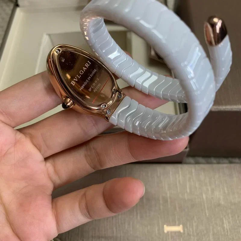 SCULPTURAL SERPENTINE-INSPIRED 35MM TIMEPIECE WITH FLEXIBLE WRAP-AROUND BRACELET