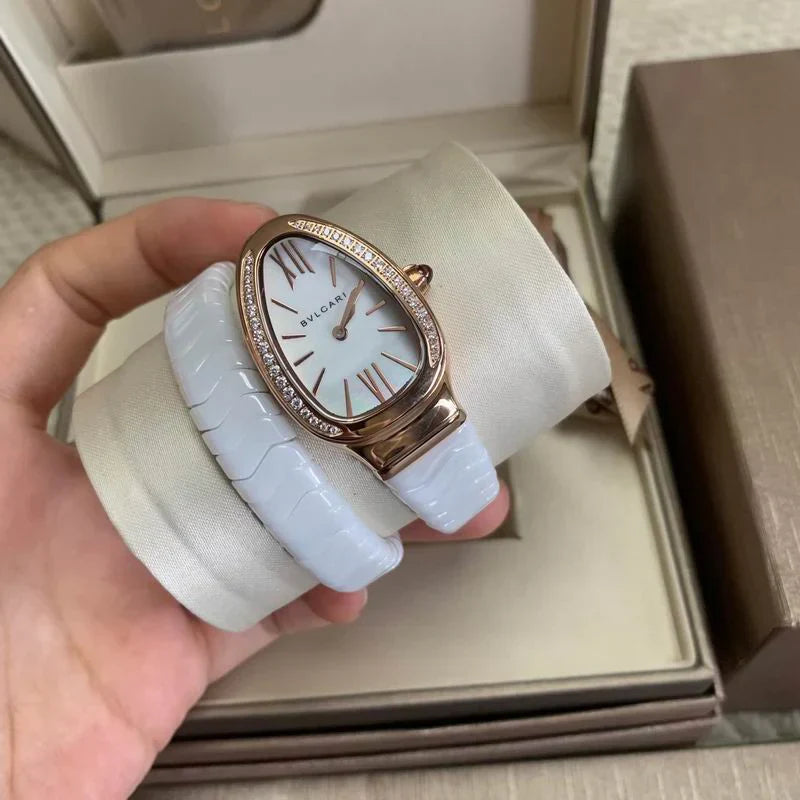 SCULPTURAL SERPENTINE-INSPIRED 35MM TIMEPIECE WITH FLEXIBLE WRAP-AROUND BRACELET
