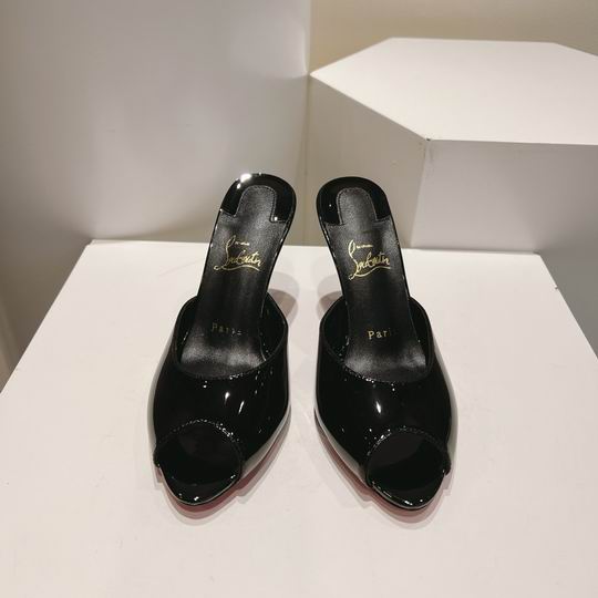 ARCHITECTURAL BLACK OPEN-TOE HIGH-HEEL MULES WITH SLEEK SLIP-ON SILHOUETTE AND POLISHED FINISH