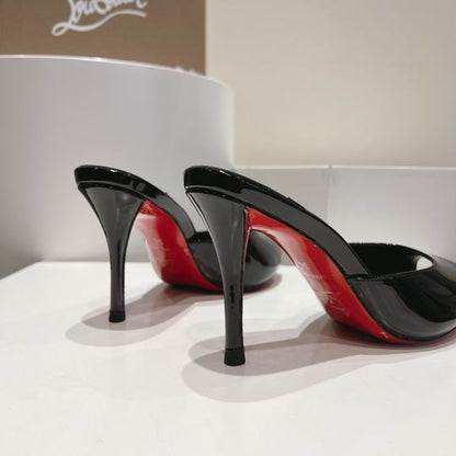 ARCHITECTURAL BLACK OPEN-TOE HIGH-HEEL MULES WITH SLEEK SLIP-ON SILHOUETTE AND POLISHED FINISH