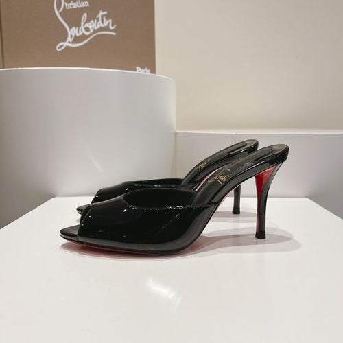 ARCHITECTURAL BLACK OPEN-TOE HIGH-HEEL MULES WITH SLEEK SLIP-ON SILHOUETTE AND POLISHED FINISH