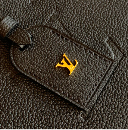 EMBOSSED LEATHER SHOULDER BAG