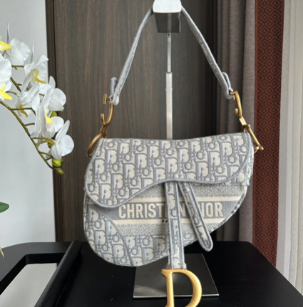 EMBROIDERED GREY DENIM ADDLE BAG WITH FRINGE