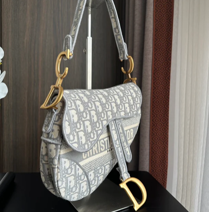 EMBROIDERED GREY DENIM ADDLE BAG WITH FRINGE