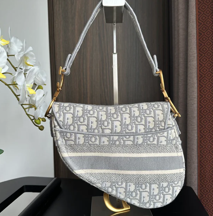 EMBROIDERED GREY DENIM ADDLE BAG WITH FRINGE