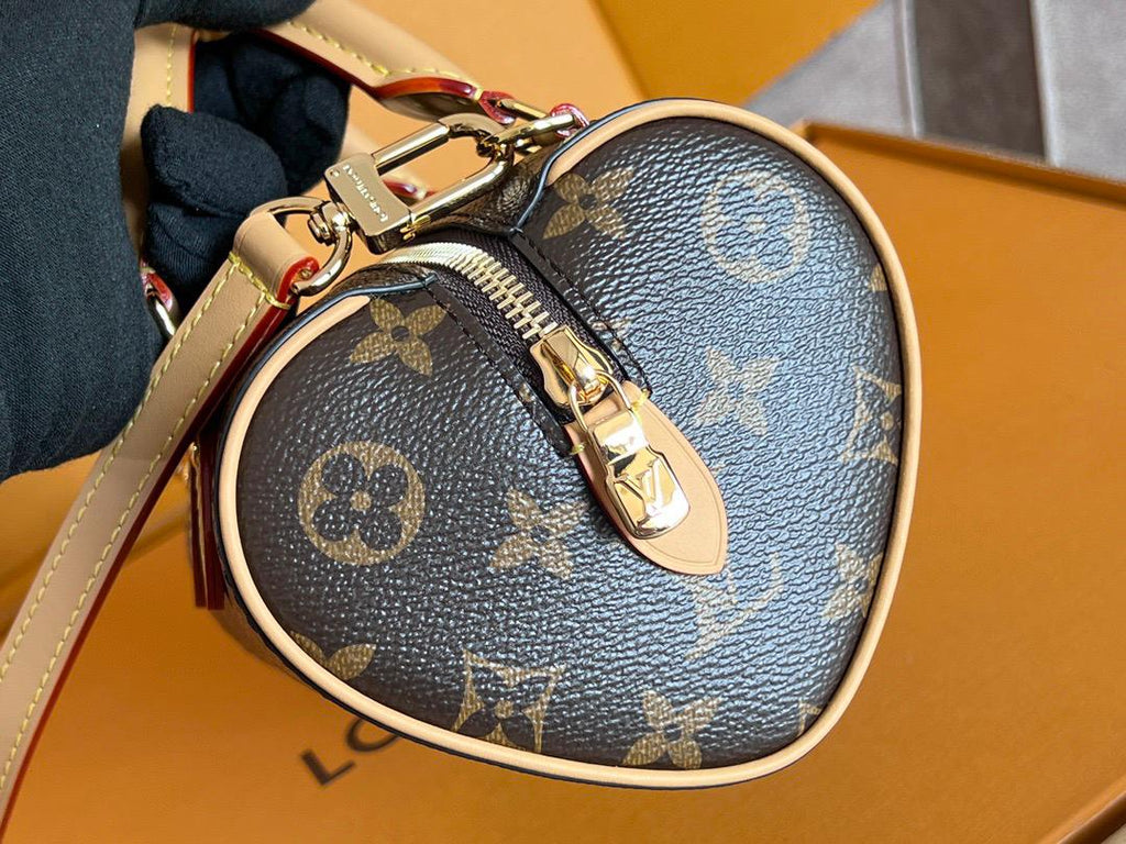 ROMANTIC HEART-SHAPED MONOGRAM POUCH