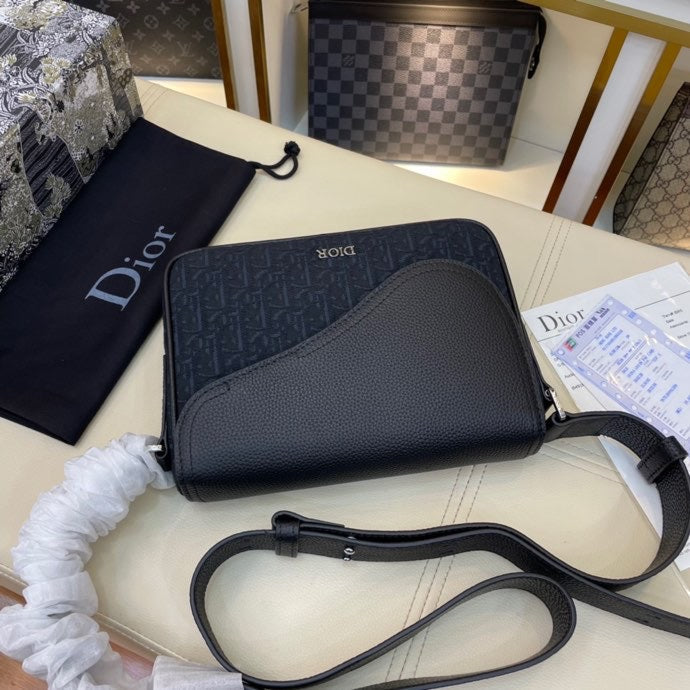 PREMIUM TEXTURED FABRIC AND LEATHER CROSSBODY BAG WITH REFINED COWHIDE HARDWARE