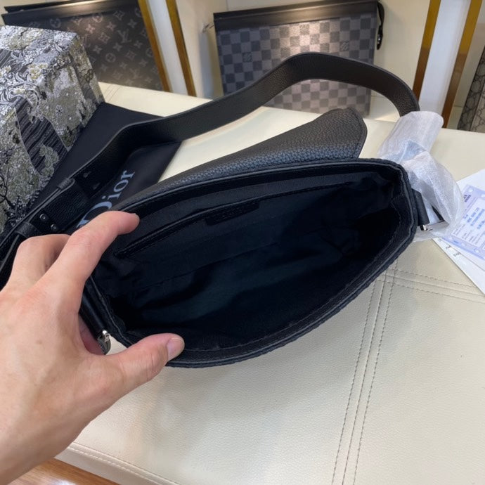 PREMIUM TEXTURED FABRIC AND LEATHER CROSSBODY BAG WITH REFINED COWHIDE HARDWARE