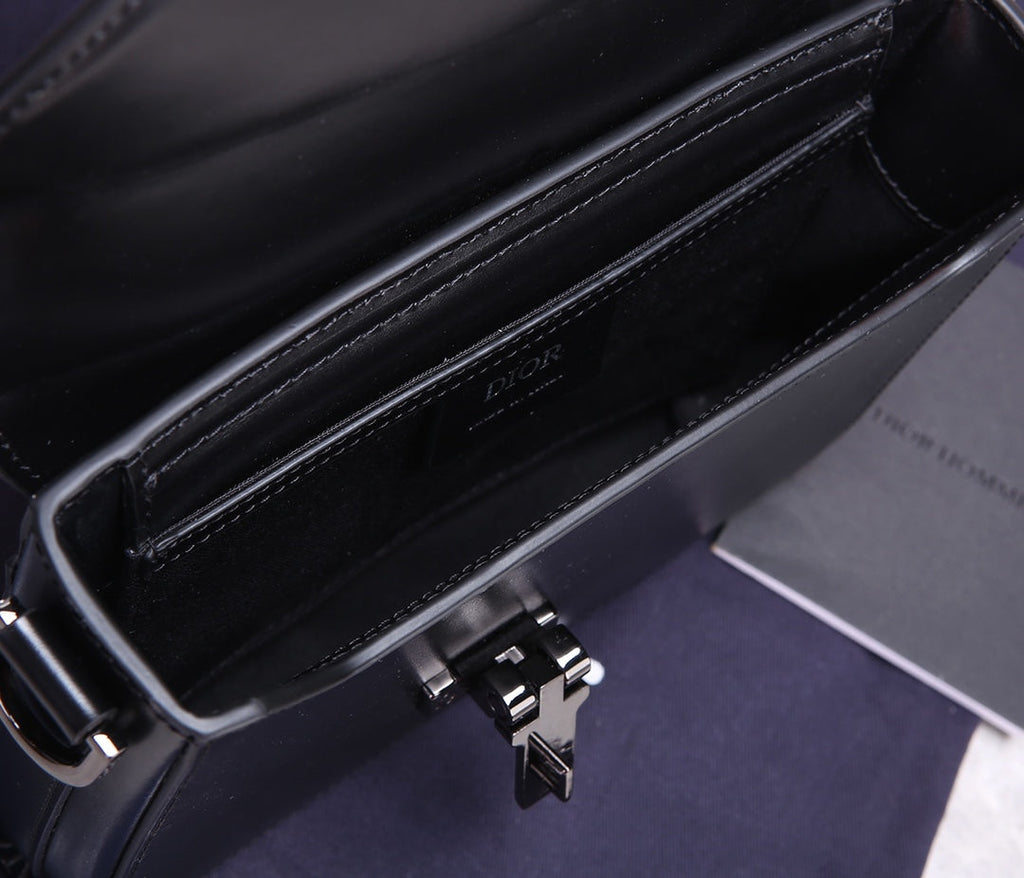 PREMIUM TEXTURED FABRIC AND LEATHER CROSSBODY BAG WITH REFINED COWHIDE HARDWARE