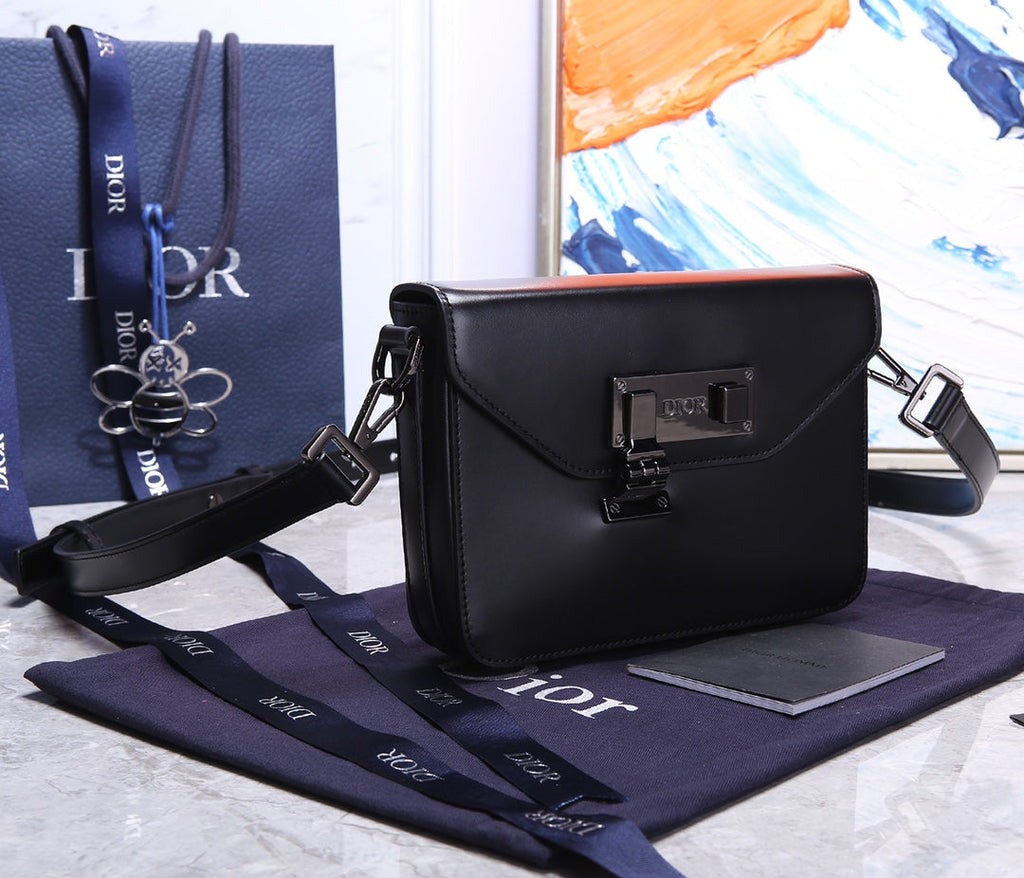 PREMIUM TEXTURED FABRIC AND LEATHER CROSSBODY BAG WITH REFINED COWHIDE HARDWARE