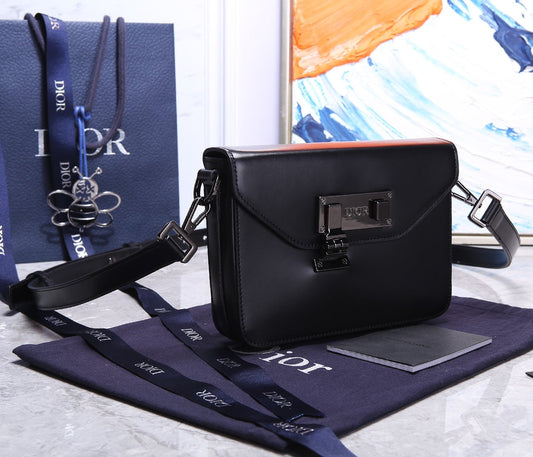 PREMIUM TEXTURED FABRIC AND LEATHER CROSSBODY BAG WITH REFINED COWHIDE HARDWARE