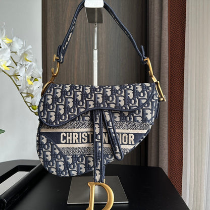 EMBROIDERED BLACK DENIM SADDLE BAG WITH FRINGE