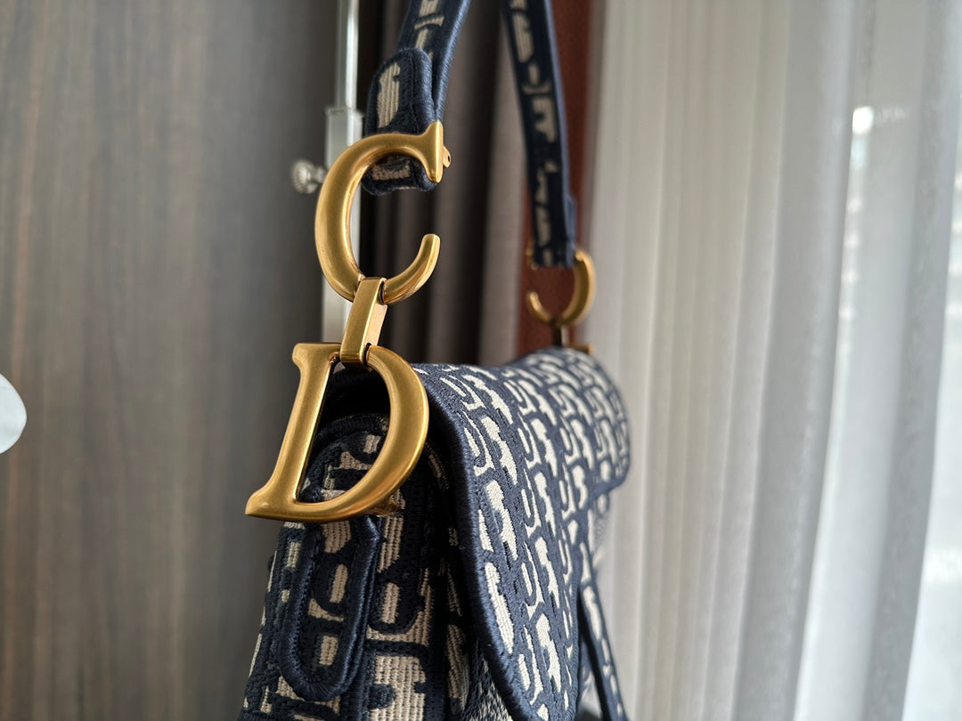 EMBROIDERED BLACK DENIM SADDLE BAG WITH FRINGE