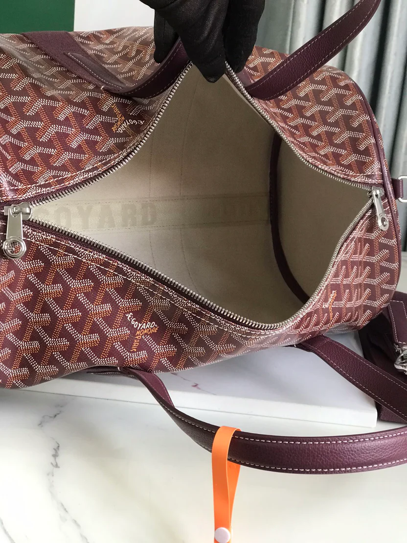 ARTISAN CHEVRON MONOGRAM BARREL DUFFEL WITH DEEP BURGUNDY ACCENTS