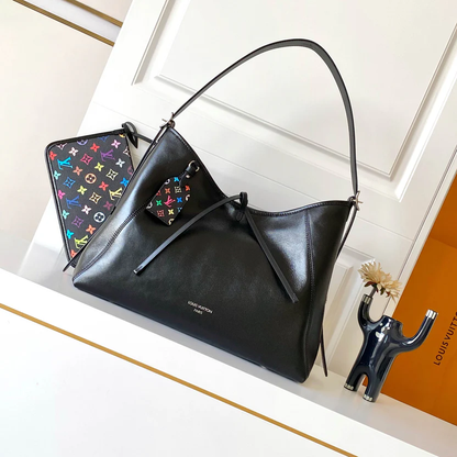 SLEEK LEATHER HOBO BAG WITH MULTICOLOR ACCENT STRAP