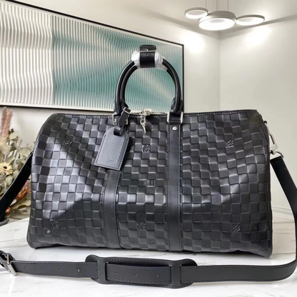 PREMIUM CHECKERED EBONY TRAVEL DUFFEL WITH REINFORCED LEATHER TRIM