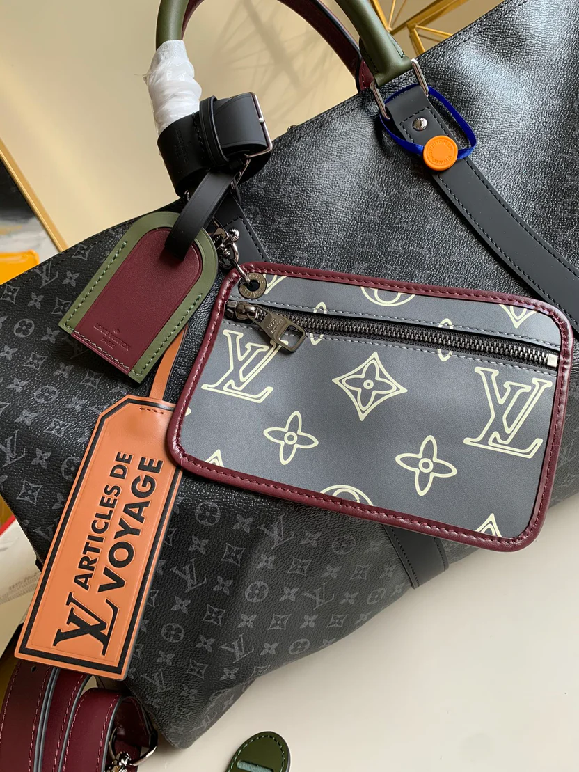 MODERN MONOGRAM GRAPHITE TRAVEL DUFFEL WITH MULTI-TONE ACCENTS