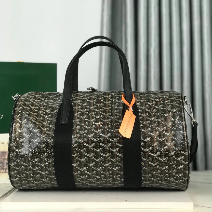 MIDNIGHT GRAPHITE CHEVRON BARREL DUFFEL WITH JET BLACK LEATHER ACCENTS