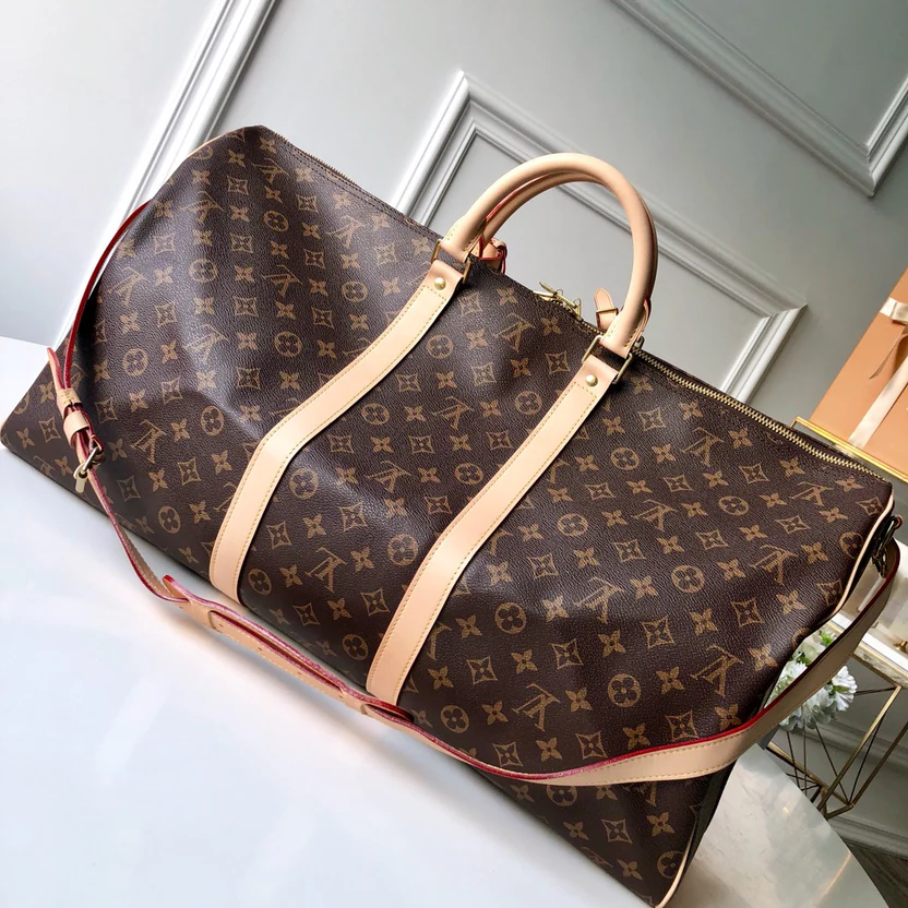 CLASSIC HERITAGE MONOGRAM TRAVEL DUFFEL