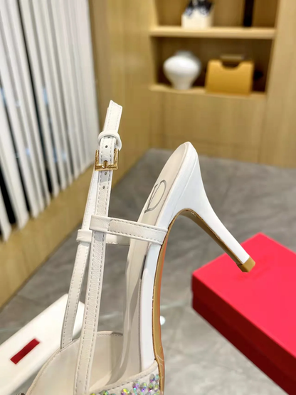 ELEGANT POINTED-TOE PUMPS WITH SCULPTURAL V-SHAPED BUCKLE AND GENUINE SHEEPSKIN LEATHER FINISH