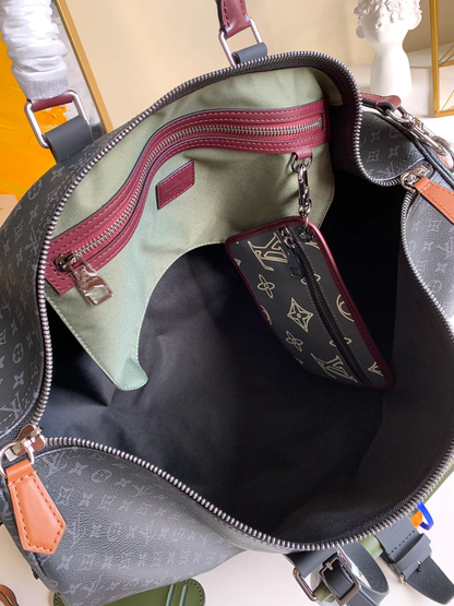 MODERN MONOGRAM GRAPHITE TRAVEL DUFFEL WITH MULTI-TONE ACCENTS