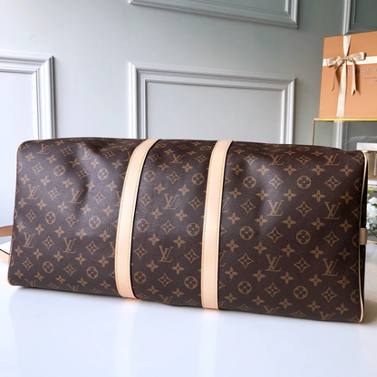 CLASSIC HERITAGE MONOGRAM TRAVEL DUFFEL