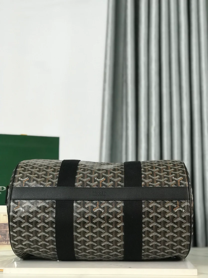 MIDNIGHT GRAPHITE CHEVRON BARREL DUFFEL WITH JET BLACK LEATHER ACCENTS
