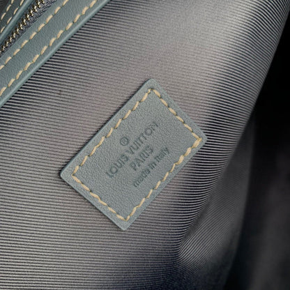 URBAN DENIM MONOGRAM EXPEDITION DUFFEL WITH EMBOSSED TEXTURE AND AZURE LEATHER TRIM
