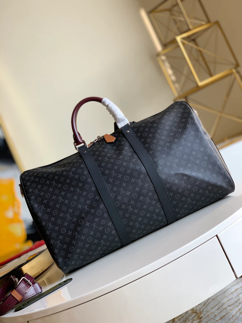 MODERN MONOGRAM GRAPHITE TRAVEL DUFFEL WITH MULTI-TONE ACCENTS