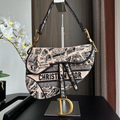 EMBROIDERED BLACK DENIM SADDLE BAG WITH FRINGE