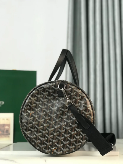 MIDNIGHT GRAPHITE CHEVRON BARREL DUFFEL WITH JET BLACK LEATHER ACCENTS