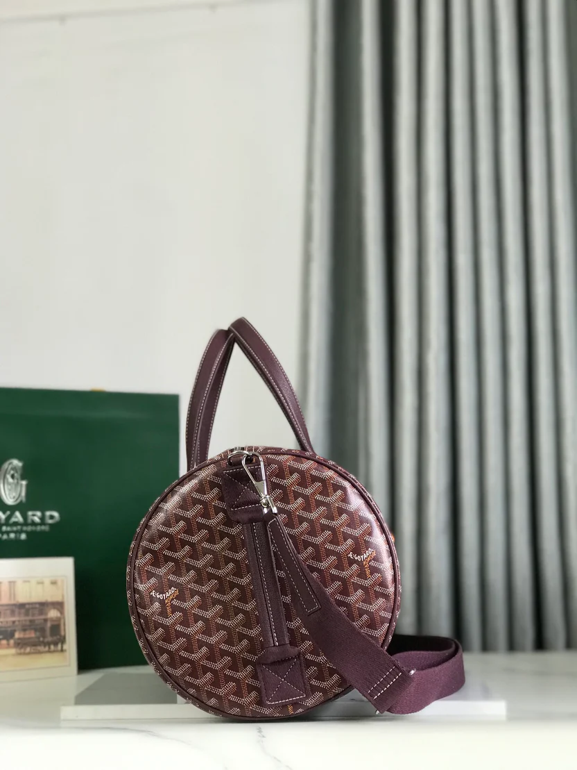 ARTISAN CHEVRON MONOGRAM BARREL DUFFEL WITH DEEP BURGUNDY ACCENTS