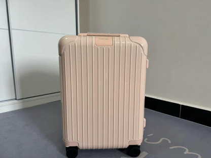 MINIMALIST PASTEL PEACH POLYCARBONATE ROLLING LUGGAGE SET WITH VERTICAL GROOVE DESIGN