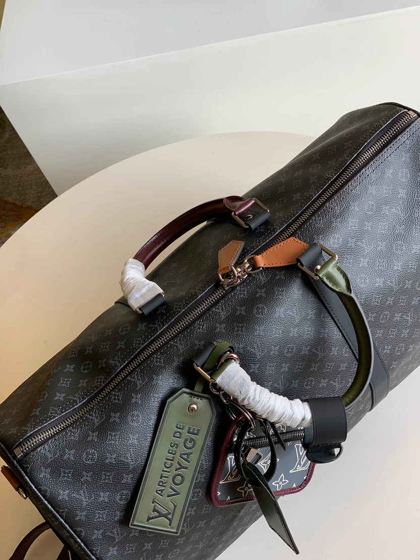 MODERN MONOGRAM GRAPHITE TRAVEL DUFFEL WITH MULTI-TONE ACCENTS
