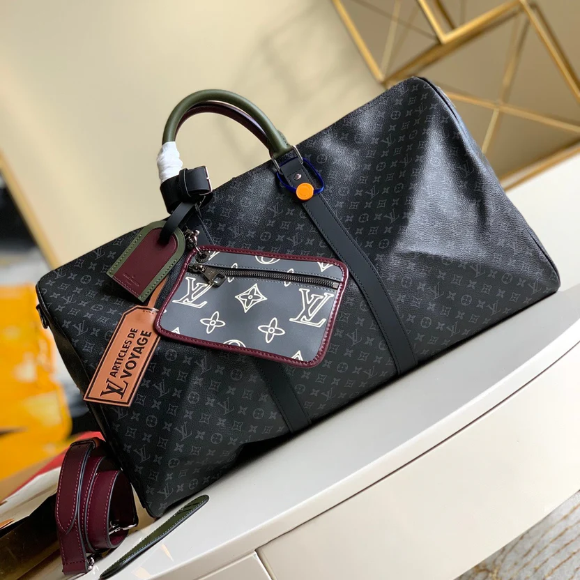 MODERN MONOGRAM GRAPHITE TRAVEL DUFFEL WITH MULTI-TONE ACCENTS