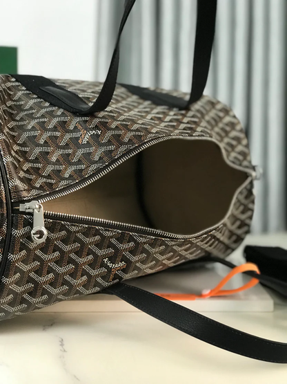 MIDNIGHT GRAPHITE CHEVRON BARREL DUFFEL WITH JET BLACK LEATHER ACCENTS