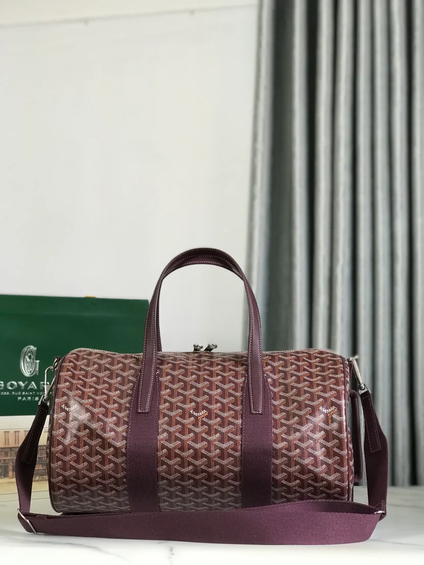 ARTISAN CHEVRON MONOGRAM BARREL DUFFEL WITH DEEP BURGUNDY ACCENTS