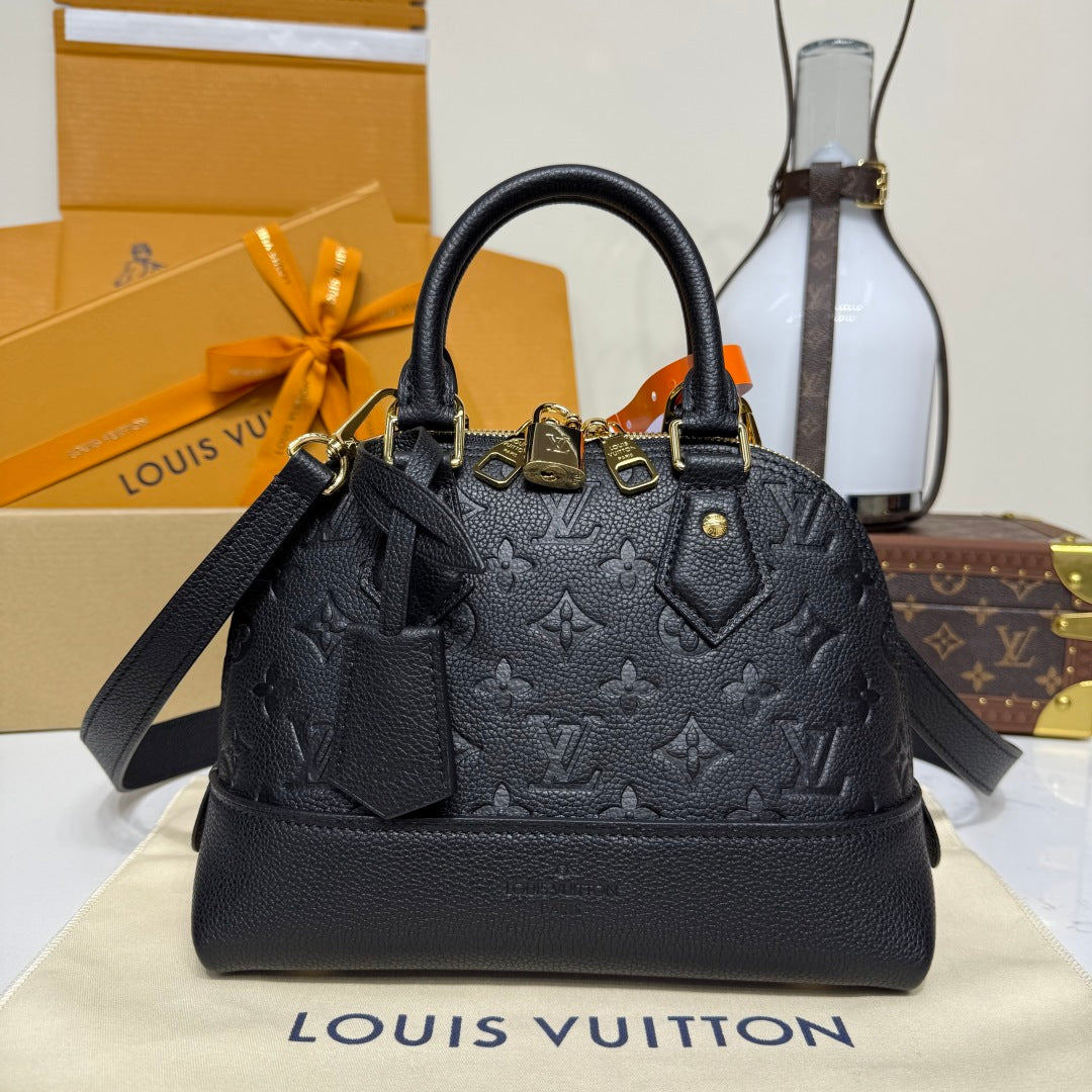 EMBOSSED MONOGRAM HANDBAG – STRUCTURED TOP HANDLE