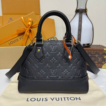 EMBOSSED MONOGRAM HANDBAG – STRUCTURED TOP HANDLE