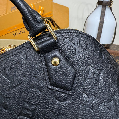EMBOSSED MONOGRAM HANDBAG – STRUCTURED TOP HANDLE